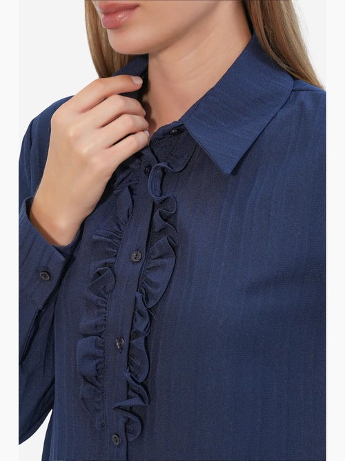 Camisa texturizada com detalhes de folhos bdart - Kiabi Camisa texturizada com detalhes de folhos bdart - Kiabi