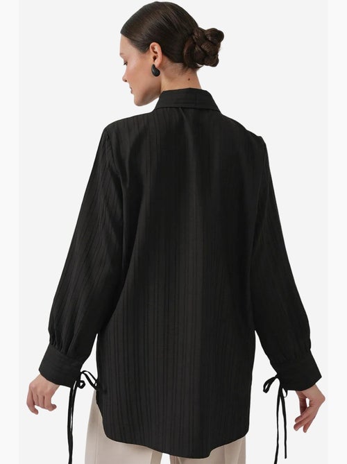 Camisa texturizada com detalhes de folhos bdart - Kiabi Camisa texturizada com detalhes de folhos bdart - Kiabi