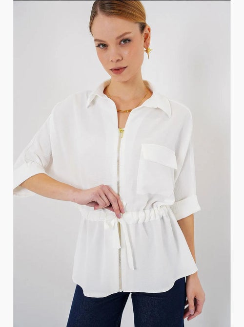 Camisa texturizada com fecho de correr e bolso bdart - Kiabi Camisa texturizada com fecho de correr e bolso bdart - Kiabi