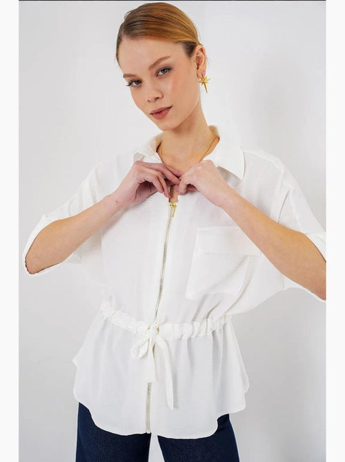 Camisa texturizada com fecho de correr e bolso bdart - Kiabi Camisa texturizada com fecho de correr e bolso bdart - Kiabi