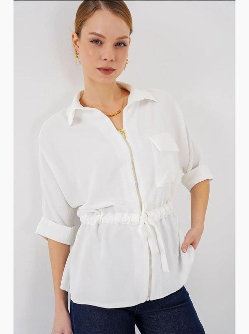 Camisa texturizada com fecho de correr e bolso bdart - Kiabi Camisa texturizada com fecho de correr e bolso bdart - Kiabi