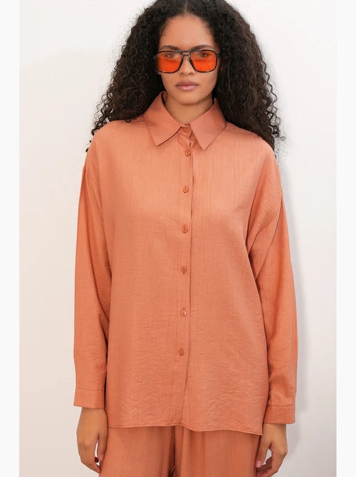 Camisa texturizada de botões com manga comprida bdart - Kiabi Camisa texturizada de botões com manga comprida bdart - Kiabi