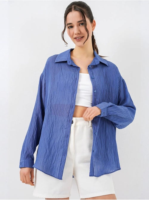 Camisa texturizada de manga comprida com botões bdart - Kiabi Camisa texturizada de manga comprida com botões bdart - Kiabi