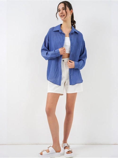 Camisa texturizada de manga comprida com botões bdart - Kiabi Camisa texturizada de manga comprida com botões bdart - Kiabi