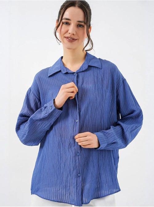 Camisa texturizada de manga comprida com botões bdart - Kiabi Camisa texturizada de manga comprida com botões bdart - Kiabi