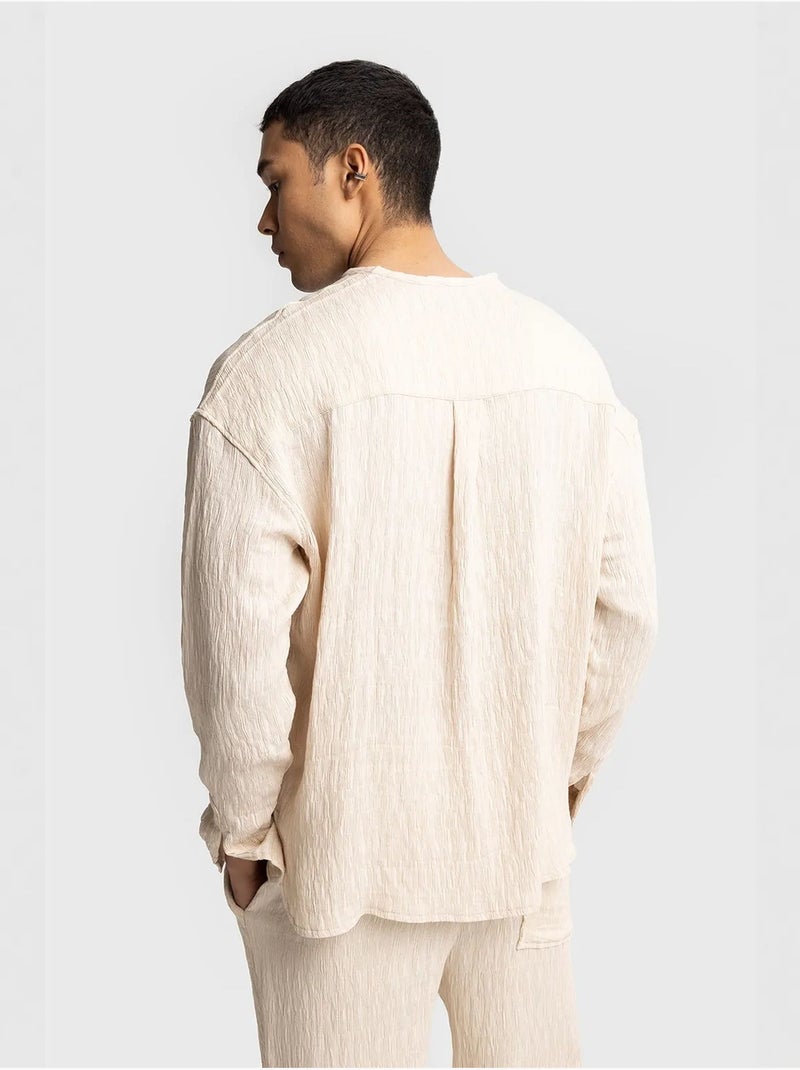 Camisa texturizada de manga comprida com decote redondo giesto Bege-argila - Kiabi
