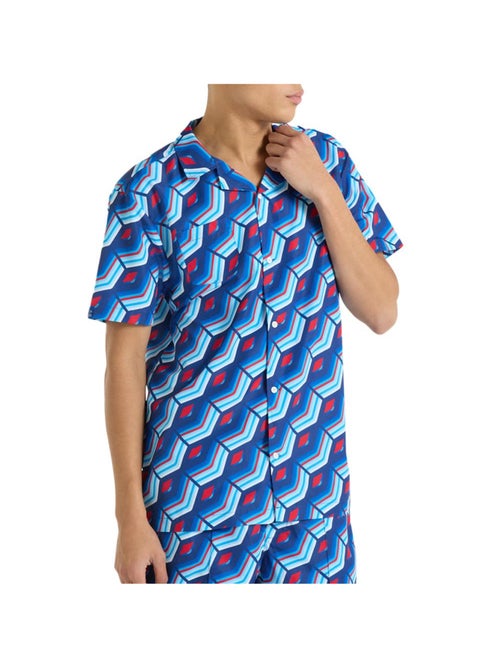 Camisa Umbro Regale Azul Estampada para Homem - Kiabi Camisa Umbro Regale Azul Estampada para Homem - Kiabi