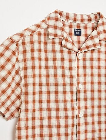 Camisa xadrez e de manga curta