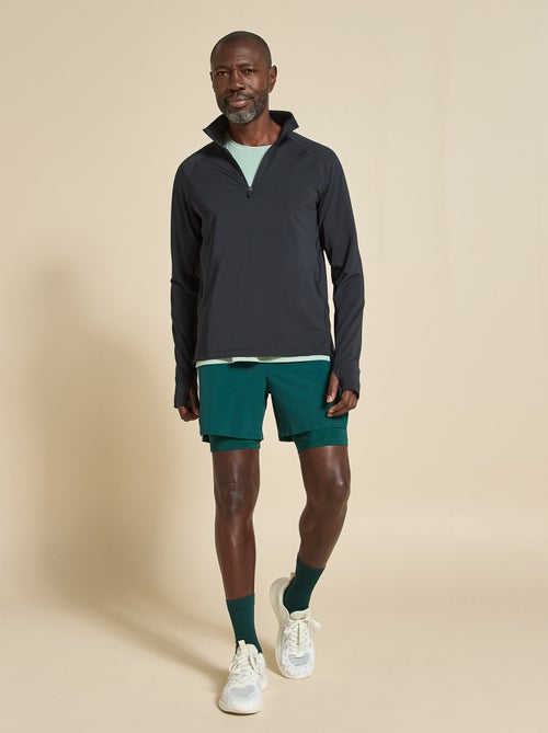 Camiseta desportiva com gola alta com fecho - (ekstract) - Kiabi Camiseta desportiva com gola alta com fecho - (ekstract) - Kiabi