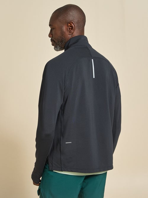 Camiseta desportiva com gola alta com fecho - (ekstract) - Kiabi Camiseta desportiva com gola alta com fecho - (ekstract) - Kiabi