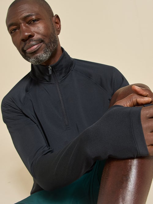 Camiseta desportiva com gola alta com fecho - (ekstract) - Kiabi Camiseta desportiva com gola alta com fecho - (ekstract) - Kiabi