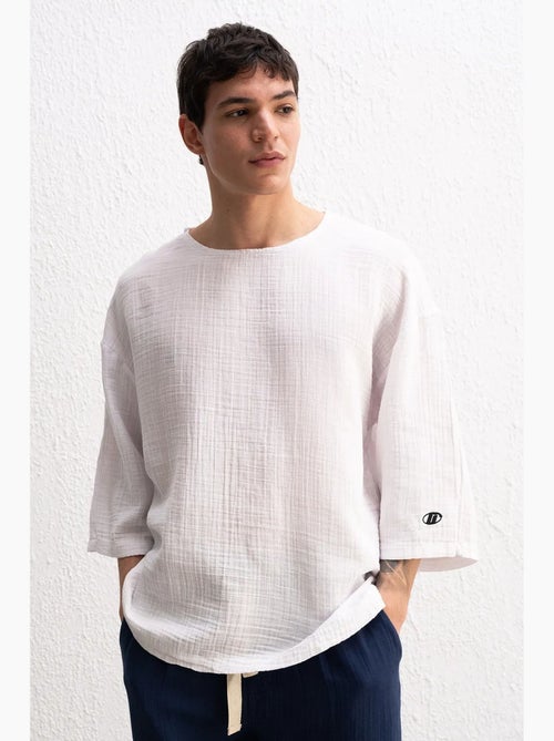 Camiseta gola redonda manga comprida em musselina giesto - Kiabi Camiseta gola redonda manga comprida em musselina giesto - Kiabi