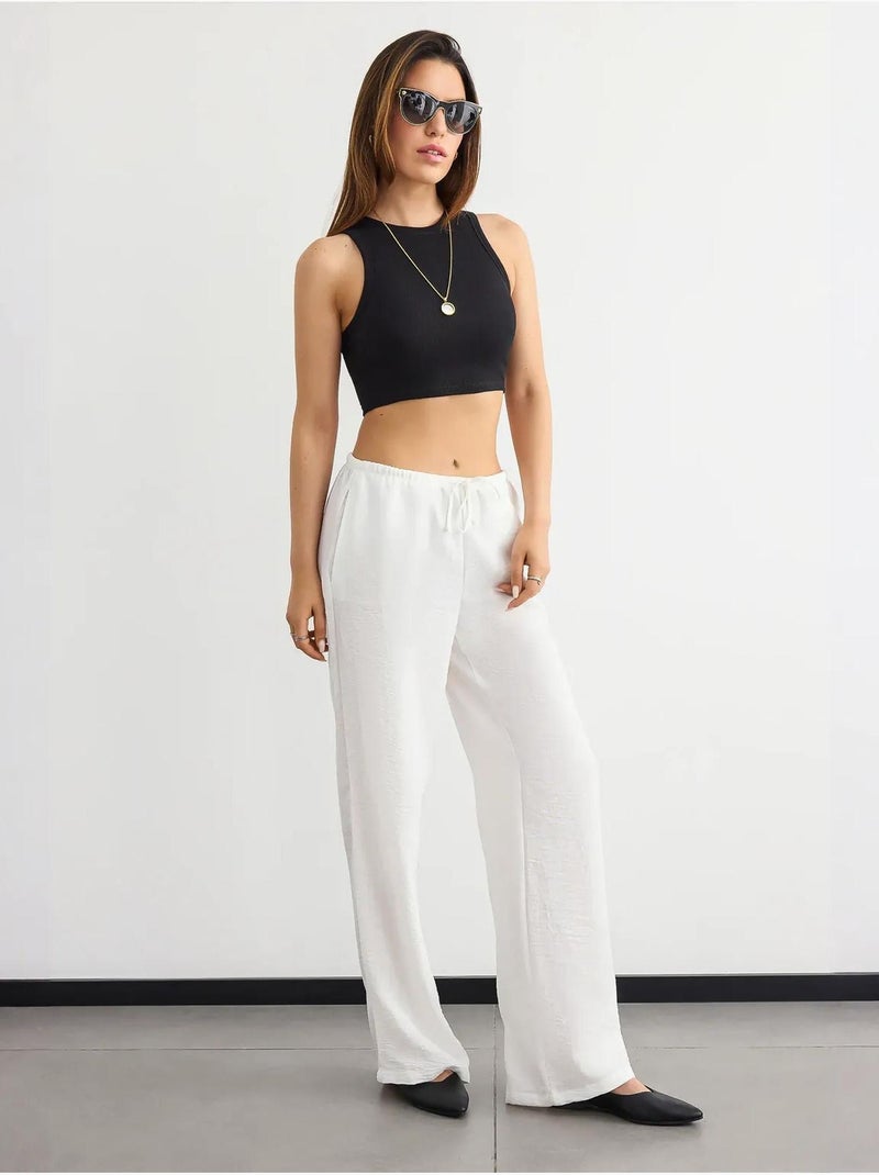 Camisola básica de gola redonda em tecido hiccup Preto - Kiabi