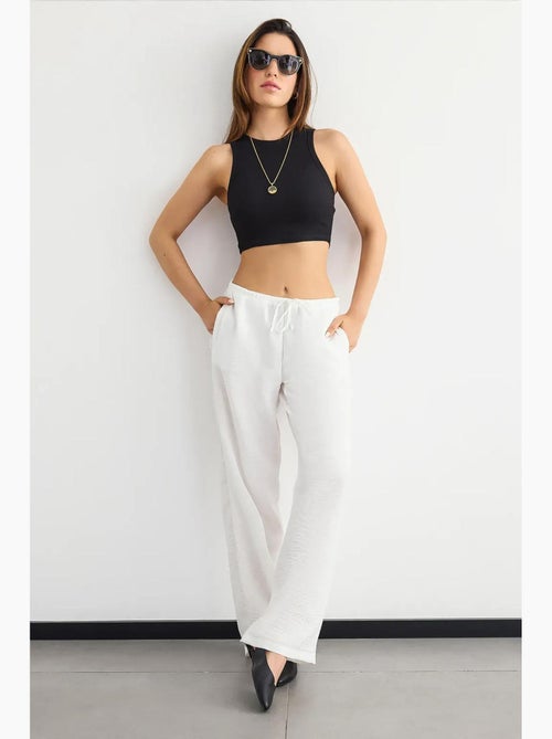 Camisola básica de gola redonda em tecido hiccup - Kiabi Camisola básica de gola redonda em tecido hiccup - Kiabi