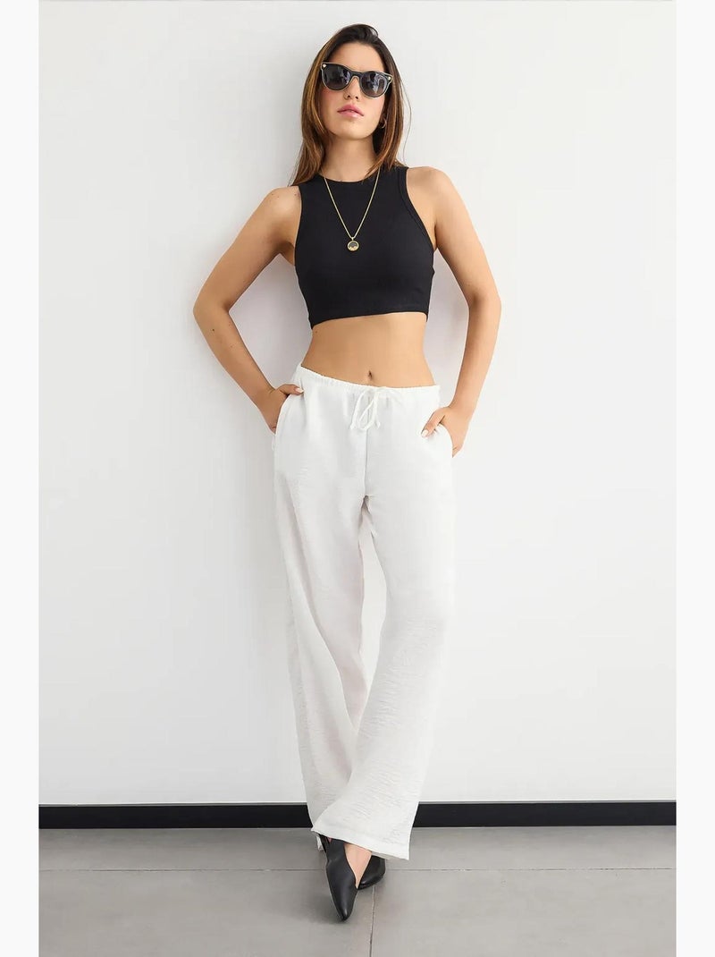 Camisola básica de gola redonda em tecido hiccup Preto - Kiabi