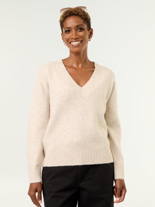 Camisola com decote em V grande em malha canelada - Kiabi Camisola com decote em V grande em malha canelada - Kiabi