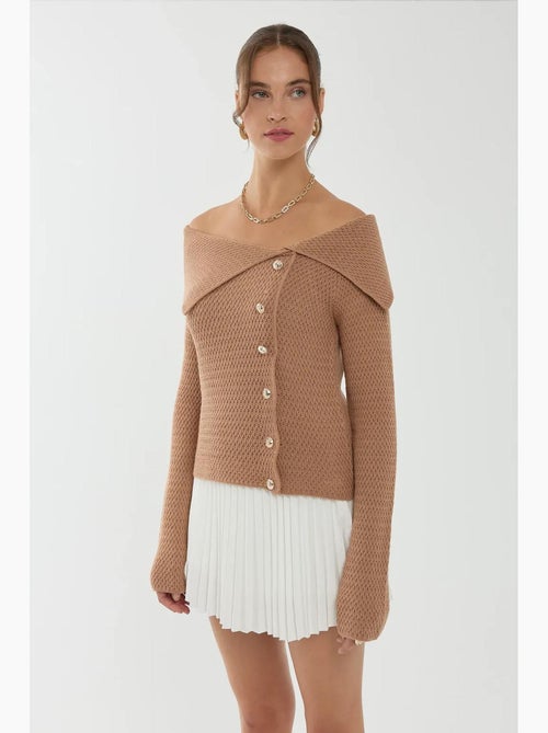 Camisola com detalhe de botão e ombro de fora hiccup - Kiabi Camisola com detalhe de botão e ombro de fora hiccup - Kiabi