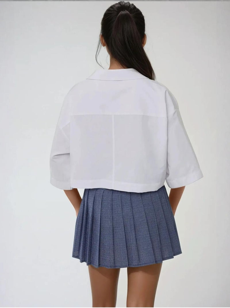 Camisola curta com detalhe de bolso Branco - Kiabi