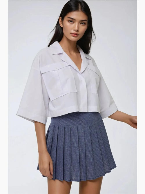 Camisola curta com detalhe de bolso hiccup - Kiabi Camisola curta com detalhe de bolso hiccup - Kiabi