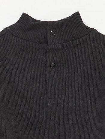 Camisola de gola alta nervurada e subida