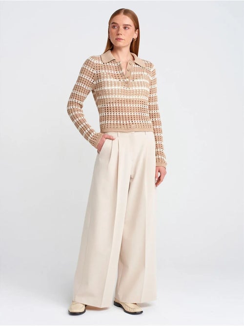 Camisola de malha às riscas com gola polo e botões - Kiabi Camisola de malha às riscas com gola polo e botões - Kiabi