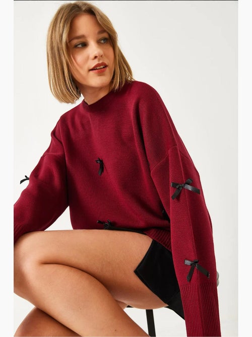 Camisola de malha com detalhe de laço lucci - Kiabi Camisola de malha com detalhe de laço lucci - Kiabi