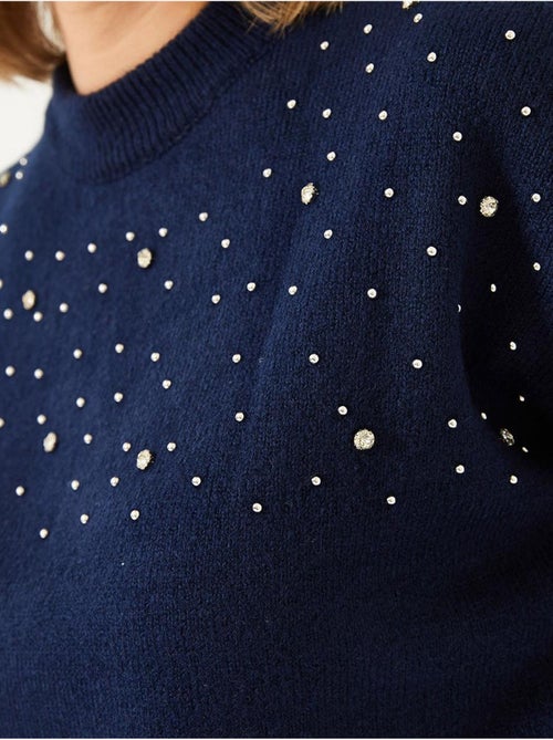 Camisola de malha com detalhes em pedra lucci - Kiabi Camisola de malha com detalhes em pedra lucci - Kiabi