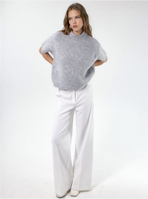 Camisola de malha com gola redonda e corte relaxed fit - Kiabi Camisola de malha com gola redonda e corte relaxed fit - Kiabi