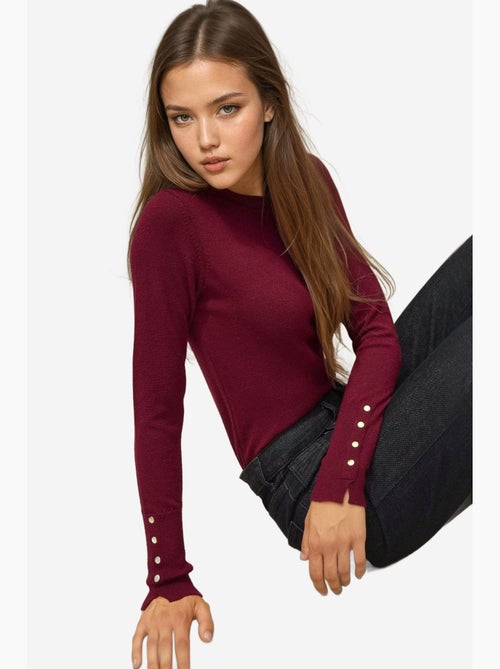 Camisola de malha com gola redonda e detalhes de botões hiccup - Kiabi Camisola de malha com gola redonda e detalhes de botões hiccup - Kiabi