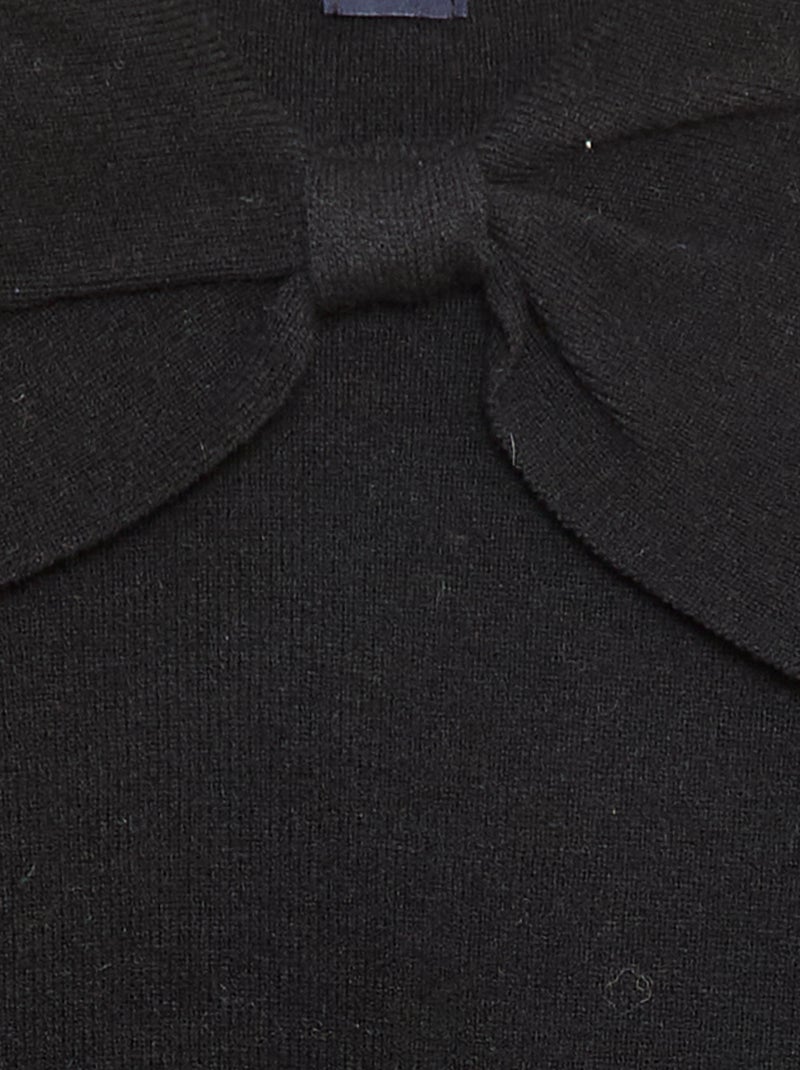 Camisola de malha com um grande laço fantasia à frente Preto - Kiabi