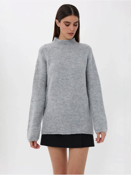 Camisola de malha oversized com gola alta - Kiabi Camisola de malha oversized com gola alta - Kiabi