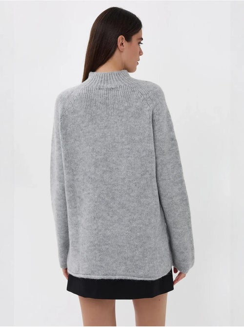 Camisola de malha oversized com gola alta - Kiabi Camisola de malha oversized com gola alta - Kiabi