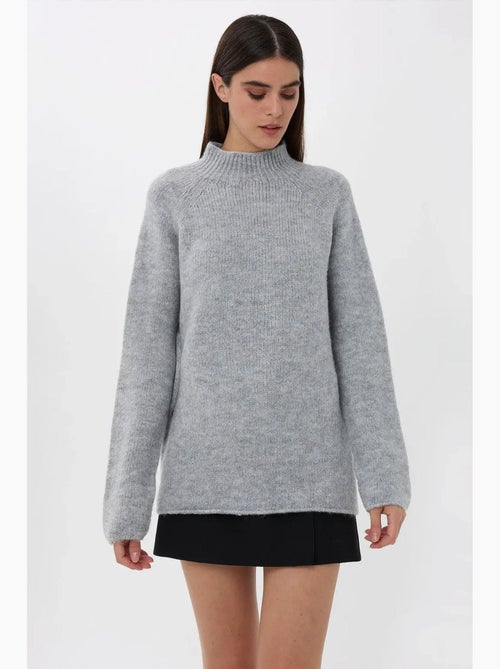 Camisola de malha oversized com gola alta hiccup - Kiabi Camisola de malha oversized com gola alta hiccup - Kiabi