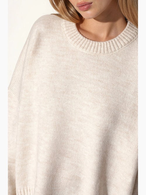 Camisola de malha oversized com gola redonda hiccup - Kiabi Camisola de malha oversized com gola redonda hiccup - Kiabi