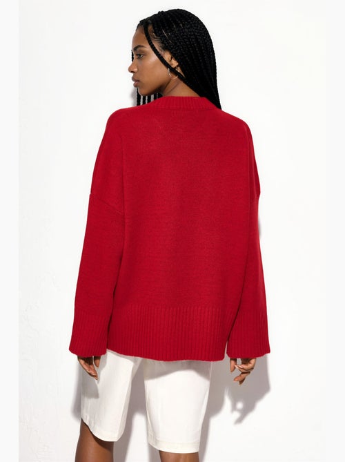 Camisola de malha oversized com gola redonda hiccup - Kiabi Camisola de malha oversized com gola redonda hiccup - Kiabi