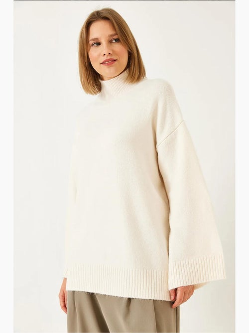 Camisola de malha oversized com meio gola alta e detalhe canelado lucci - Kiabi Camisola de malha oversized com meio gola alta e detalhe canelado lucci - Kiabi