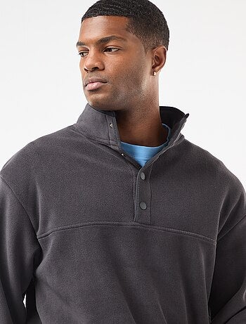 Camisola em polar gola alta com botões de pressão