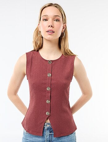 Camisola sem mangas com abertura por botões dourados martelados
