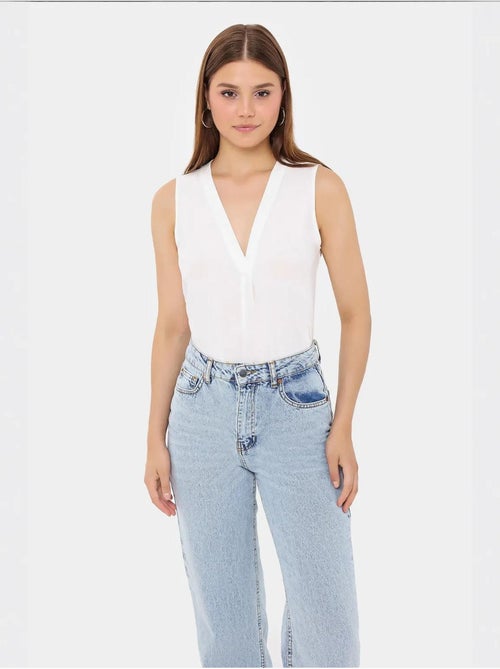 Camisola sem mangas com decote em V semitransparente - Kiabi Camisola sem mangas com decote em V semitransparente - Kiabi