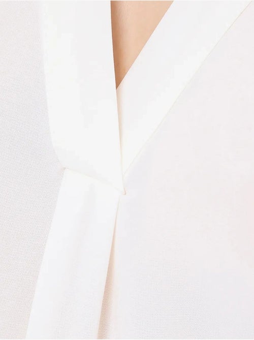 Camisola sem mangas com decote em V semitransparente - Kiabi Camisola sem mangas com decote em V semitransparente - Kiabi