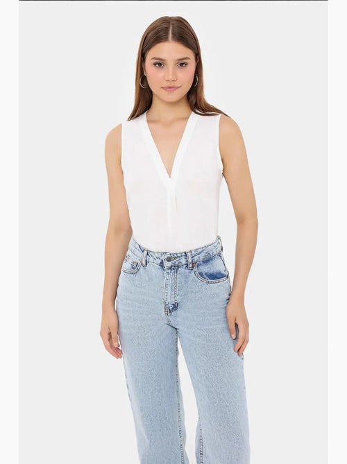 Camisola sem mangas com decote em v semitransparente hiccup - Kiabi Camisola sem mangas com decote em v semitransparente hiccup - Kiabi