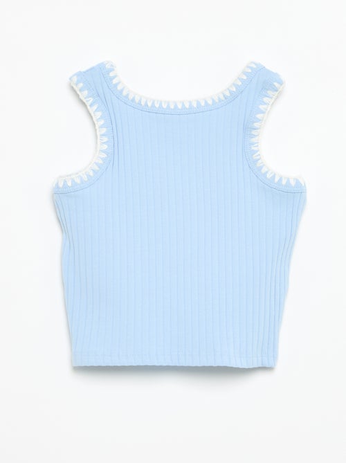Camisola sem mangas em canelado com bordados nas cavas - Kiabi Camisola sem mangas em canelado com bordados nas cavas - Kiabi