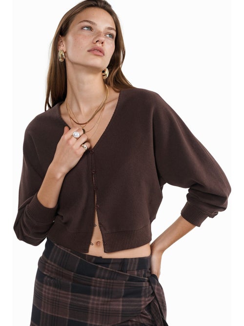 Cardigan curto canelado com decote em v busem - Kiabi Cardigan curto canelado com decote em v busem - Kiabi