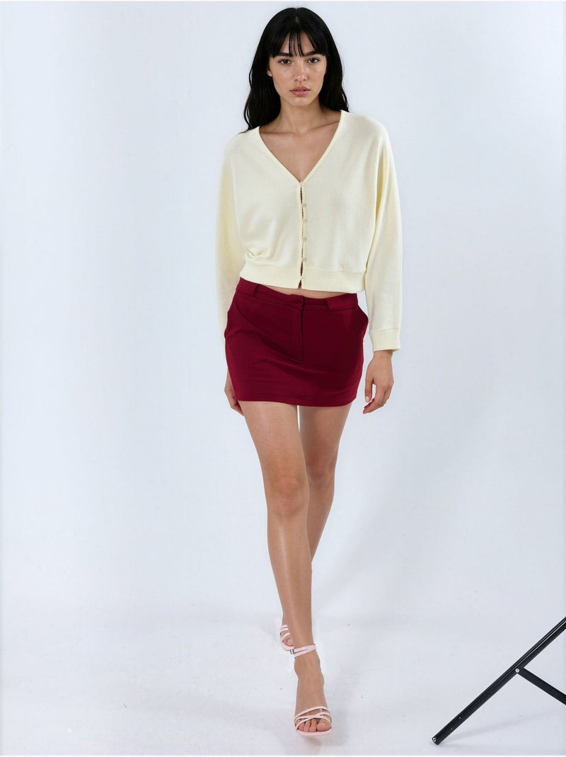 Cardigan curto canelado com decote em v busem Creme - Kiabi
