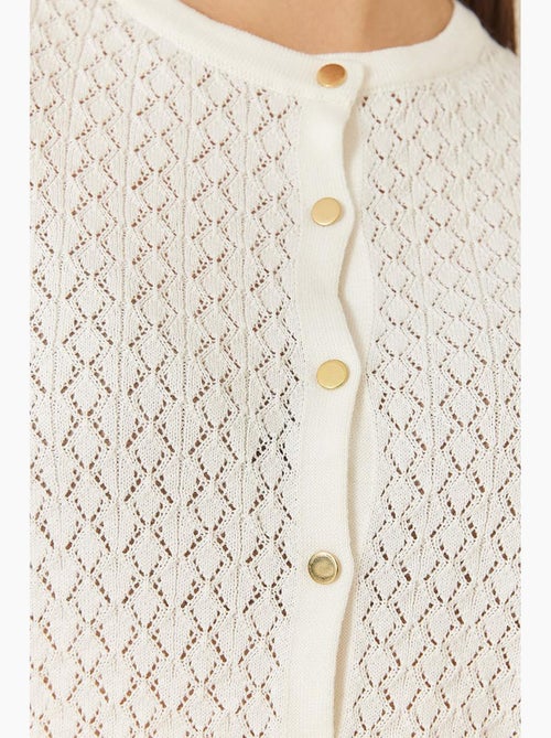 Cardigan de malha com botões vazados e manga comprida lucci - Kiabi Cardigan de malha com botões vazados e manga comprida lucci - Kiabi