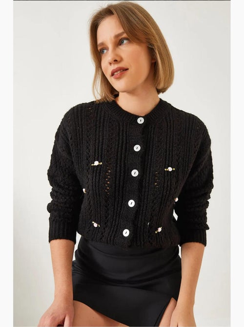 Cardigan de malha floral vazado lucci - Kiabi Cardigan de malha floral vazado lucci - Kiabi