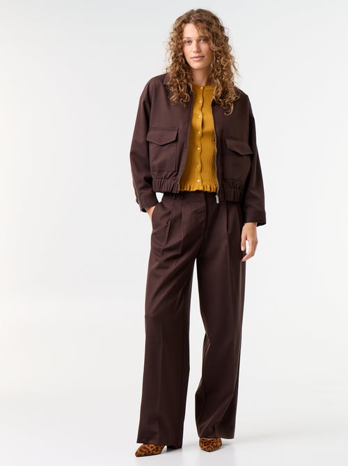 Cardigan liso canelado com acabamentos em folhos - Kiabi Cardigan liso canelado com acabamentos em folhos - Kiabi