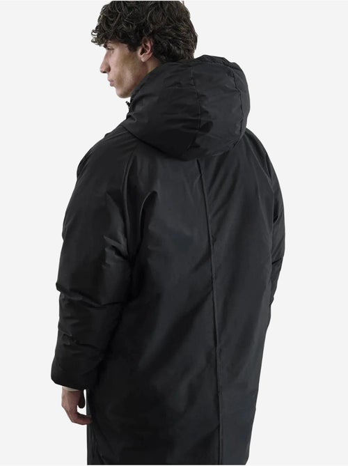 Casaco acolchoado comprido de penas espesso com capuz e bolso giesto - Kiabi Casaco acolchoado comprido de penas espesso com capuz e bolso giesto - Kiabi