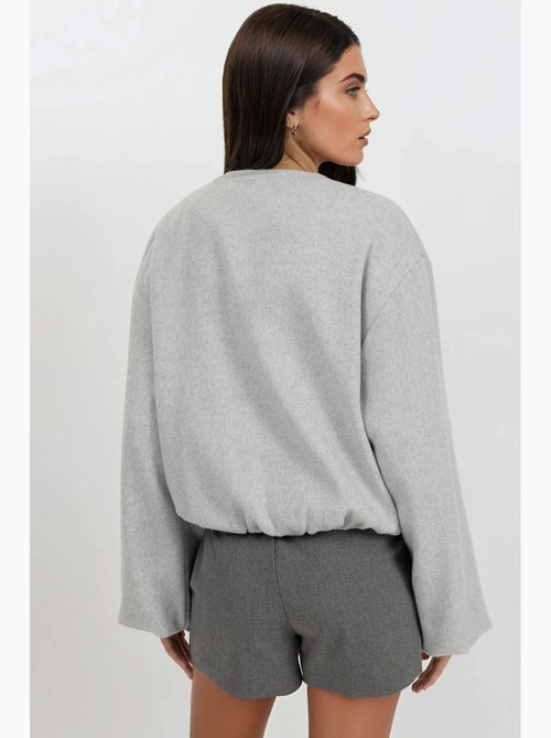 Casaco bomber oversized texturizado com fecho de correr integral hiccup - Kiabi Casaco bomber oversized texturizado com fecho de correr integral hiccup - Kiabi