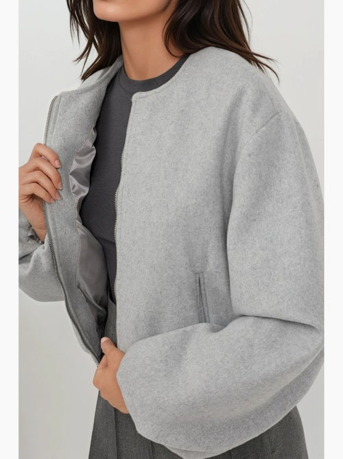Casaco bomber oversized texturizado com fecho de correr integral hiccup - Kiabi Casaco bomber oversized texturizado com fecho de correr integral hiccup - Kiabi